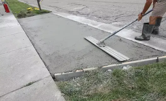 fixing sidewalk concrete